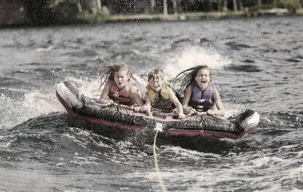 Kids on a tube at Lost Bridge Marina on Beaver Lake